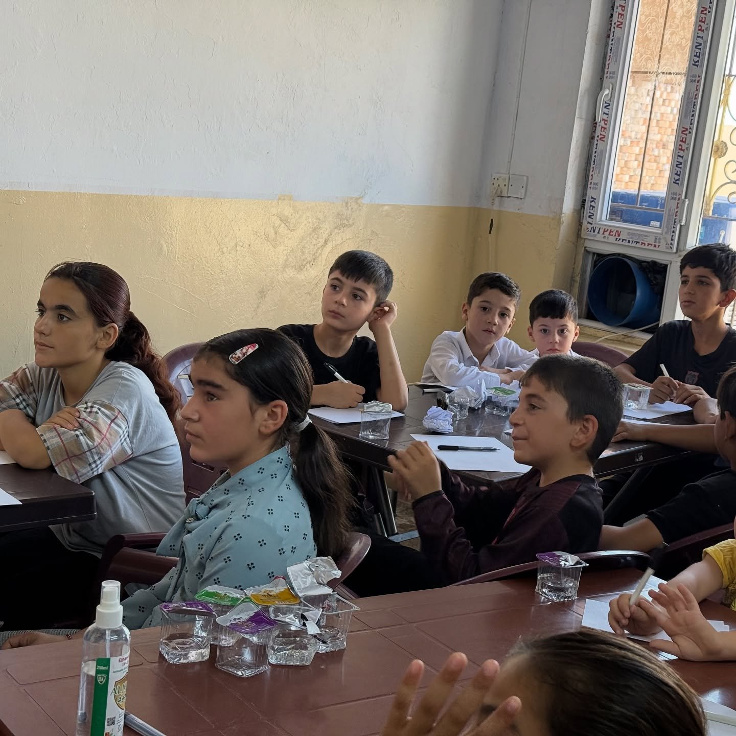 Children and volunteers at the Child Friendly Space in Sinjar